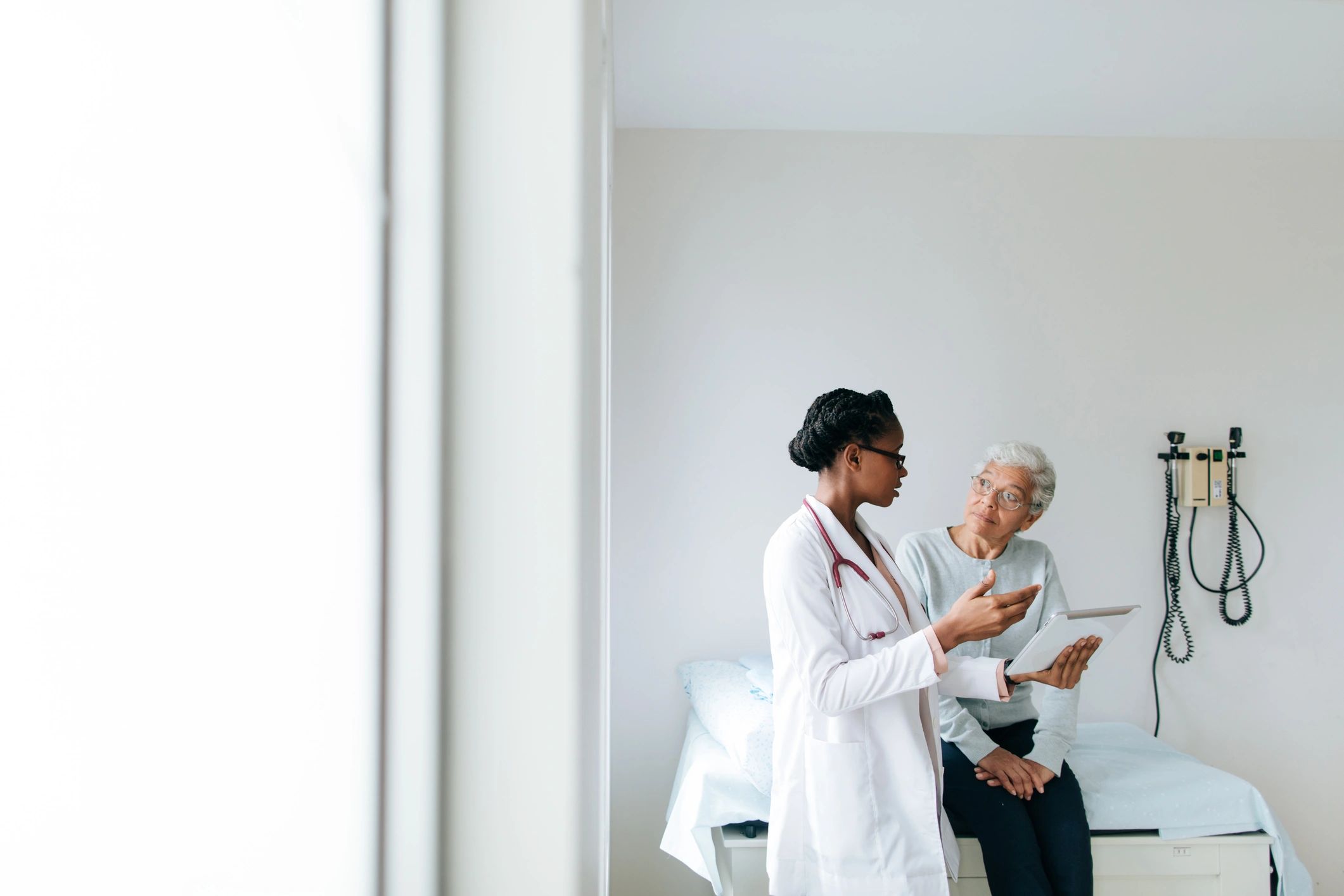 Doctor consulting a patient in hospital