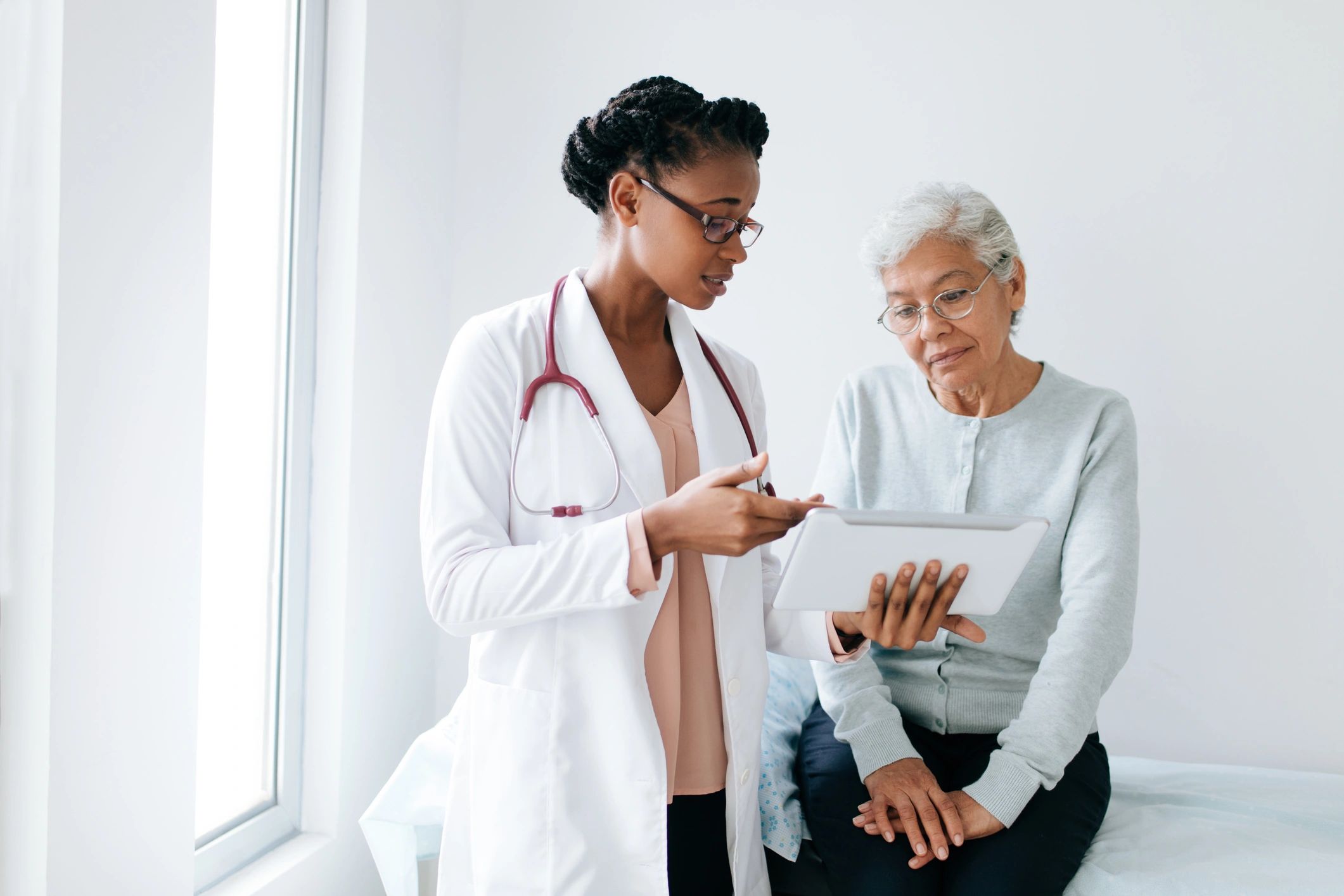Doctor consulting with a patient in a hospital setting