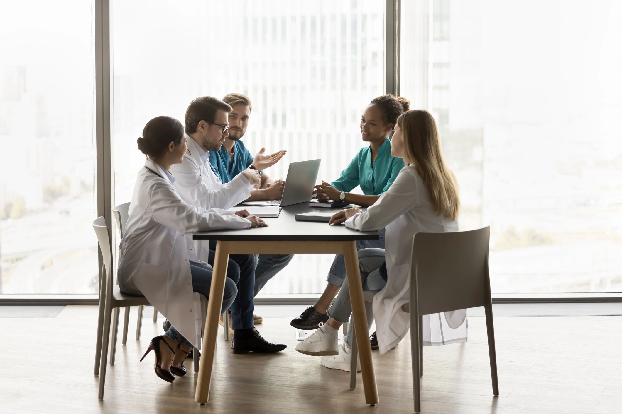 Medical faculty in research meeting
