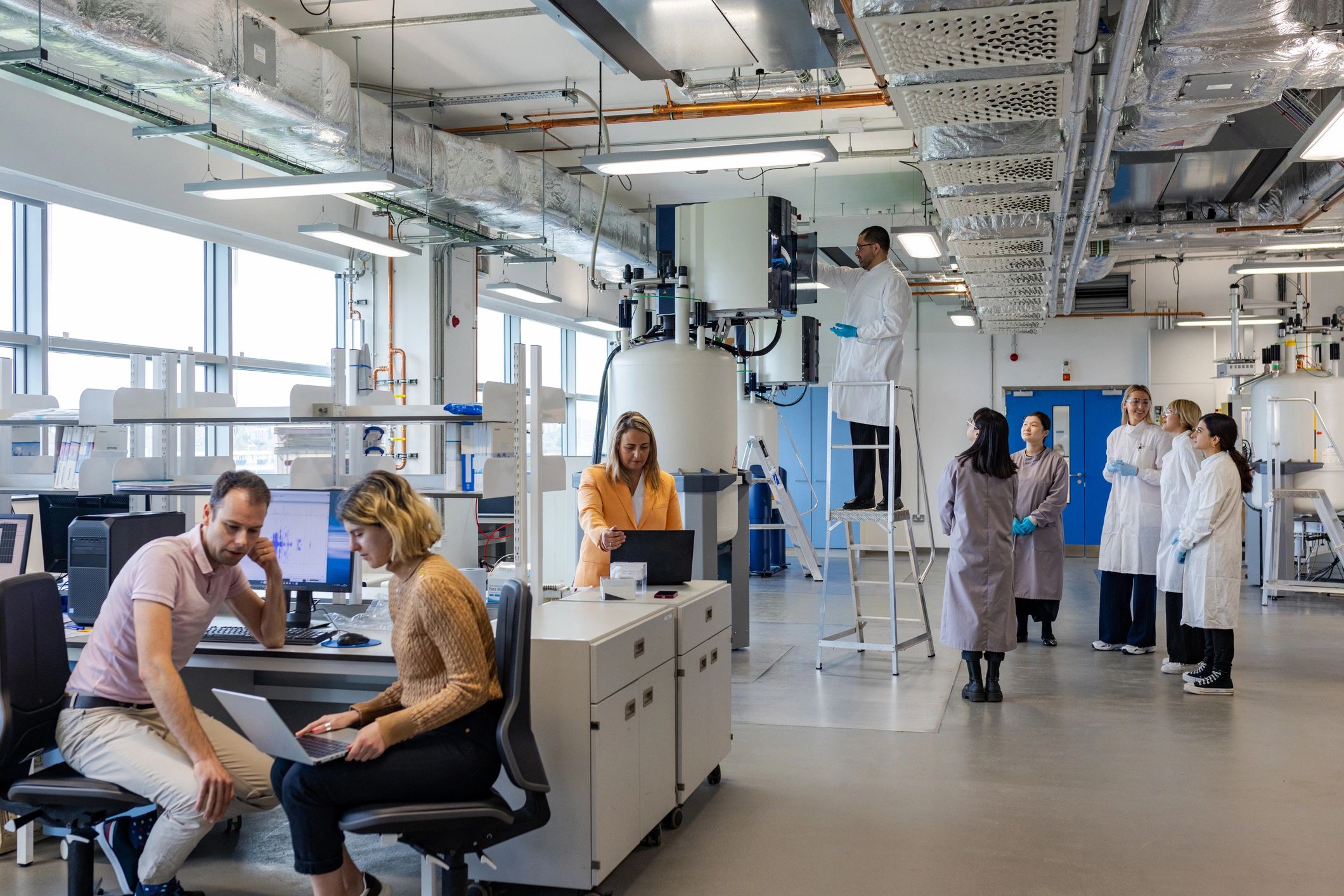 Scientists reviewing test results in a medical laboratory