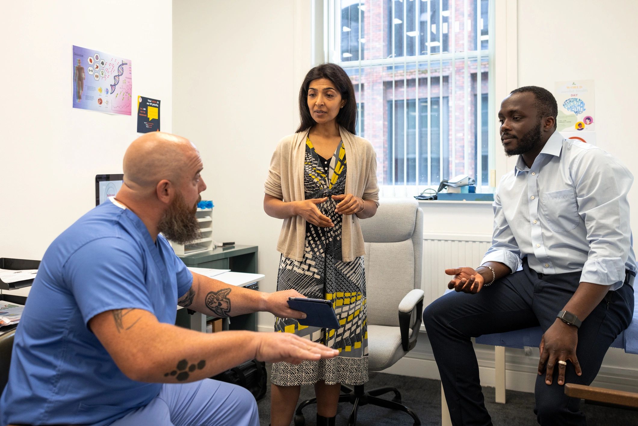Doctors and nurse in academic discussion